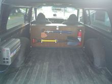 Home built box with all the essentials inside. 3000 watt power inverter on the far left. Rhino Liner is throughout the vehicle.