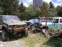 2000 Cherokee and 2 Jeepsters. Going to make one nice one out of the 2, set of Rockwell axles we have may find their way under whats left.