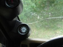 Gauge pod shows voltage of secondary battery, both to tell whether it's charging while the 240amp alternator are spinning and how much juice is left while in use.  The other is a tap into my O2 sensor to determine fuel ratio.