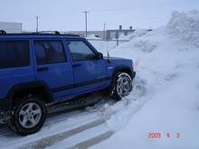 trust me, I tried to climb that snow pile, check the tracks! too soft/wet snow. plus the ice on the ground does not help.