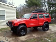 2000 jeep cherokee with 3in lift and 2in rough country spacers and shackles. 33in bfg km2s. flowmaster exhaust k&amp;n intake. roof rack and off road bumpers
