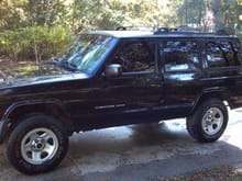 my jeep as of 11/30/11. side molding removed, fender trim removed. limo tint all around. RC 4.5 in lift coming for christmas.
