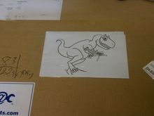 Asked them to "draw a dinosaur with a machine gun" on the box.