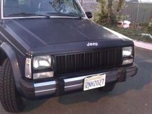 Newly painted headlight bezels, grill and new white turn marks.