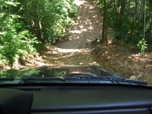 Sliding down a steep slope trying to follow some lifted XJ's!