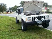 01 xj 2in bb 235/75/15's blown efan behind the magic kingdom