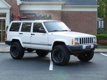 This is the before picture when she was purchased. Lifted 3 more inches , painted, new front bumper, and lots of other replacements.