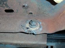 I have no idea why this washer was welded here unless this nut pulled through or something