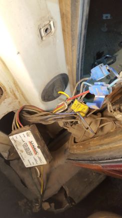 trailer hitch light. if you notice, the wires for Tail Ground and Left Turnstop are all attached, but for some reason the green wire (The one that had been exposed) is cut and instead spliced to some random unknown green wire leading into car