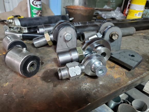 I did cheap out and will be running bushings on the axle end partly because the 1.25 heim wont clear in my raised bracket.

Had to share