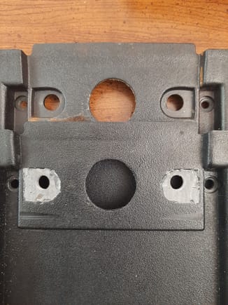 With the internal void already filled, half my problems are already gone. This picture shows how I filled in these two divits to allow the hinge to make full contact with the plate when tightened down.