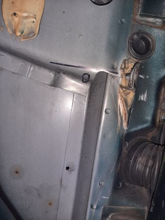 I marked out the holes on the inside and drilled a pilot hole. You can see I drew about where the top hole will land and the part that will need cut off to make it easier.