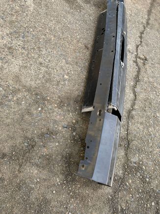 Ended up cutting along the bottom of the angle and mostly flattening out the angle. Left the crease line in so it matched the rest of the bumper.