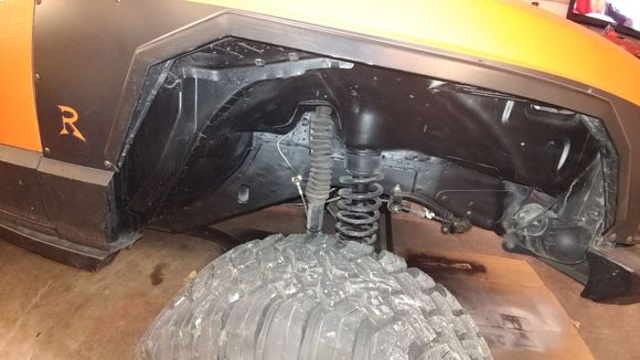 Frame stiffener and brake line