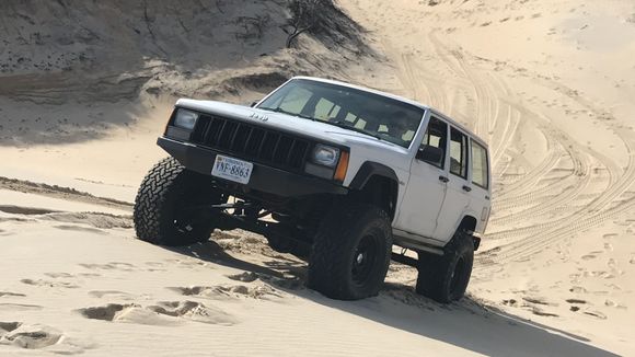 Climbing a dune in OBX.
