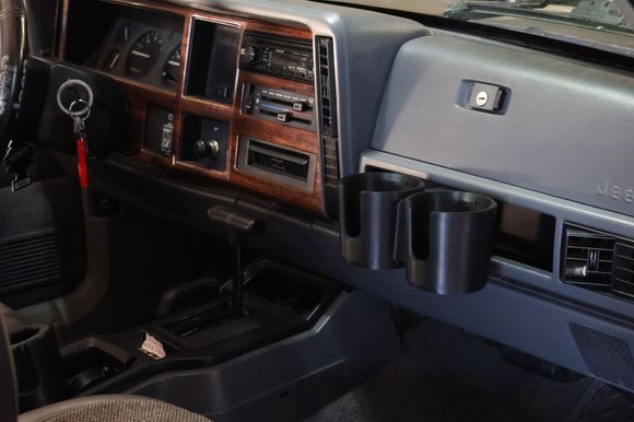 Double cup holder with both locking rings uninstalled. 