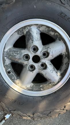 After numerous strippers applied and power washed.