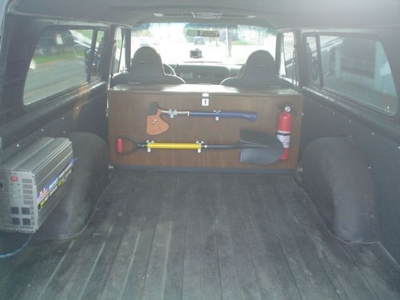 Home built box with all the essentials inside. 3000 watt power inverter on the far left. Rhino Liner is throughout the vehicle.