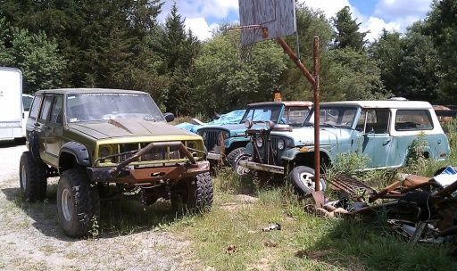 2000 Cherokee and 2 Jeepsters. Going to make one nice one out of the 2, set of Rockwell axles we have may find their way under whats left.
