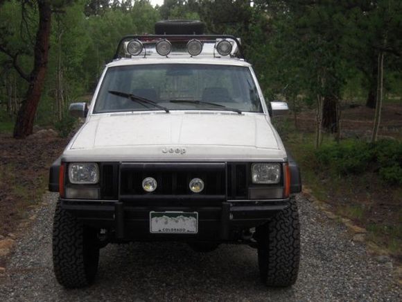 It ended up with about 4½" of lift.  3" ProComp Leaf Springs and 2" Shackles, ZJ springs and 1.5" spacers on the front.
