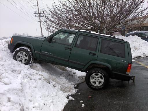 Jeep on snow bank