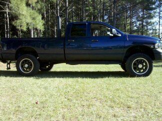 the ole cummins (sold)... barked 2nd on 37's with a automatic... enough said ;)