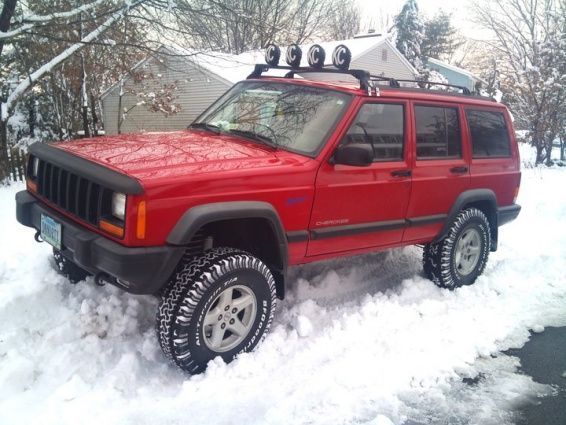 Just out of the shop. New lift and tires.  Snow!!!