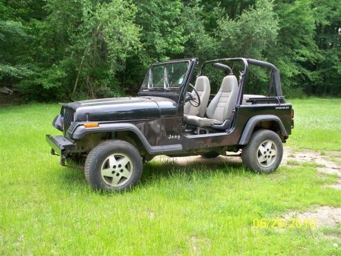 92 wrangler when i first got it, 4 cyl 5 speed, my first jeep