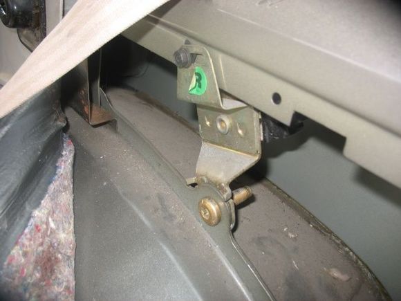 lower seat belt mounting using existing holes