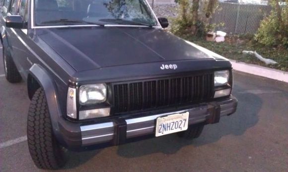 Newly painted headlight bezels, grill and new white turn marks.