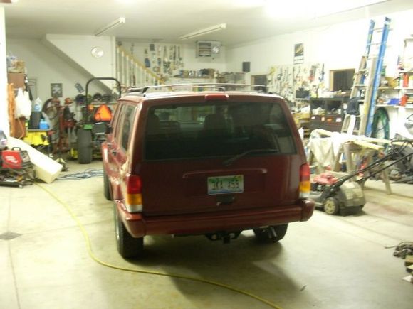Green tailgate now painted Chile Pepper Red to match. Also had end caps painted and rear bumper. And the shop, insulated, heated, 220v electrical, 5 high output 8' flourescent lights, hot/cold water and sound system! An upstairs storage area keeps parts I'm not using out of my way. (Getting full). I have my large compressor up there also so I don't have to hear it.