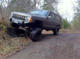 Rear tire is just off the ground in this photo :p