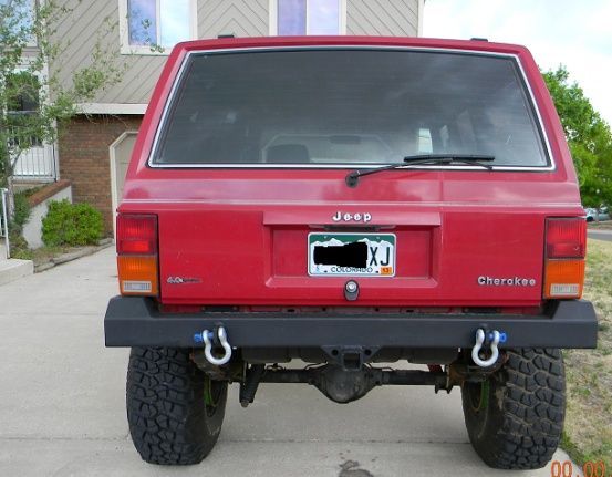 jeep back side ( kinda thought it was funny that my license plate has xj in it.)