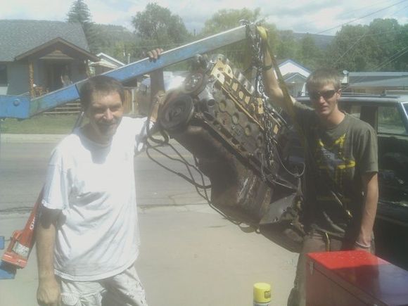 Father and son after pulling the engine