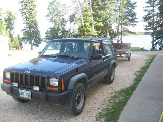 Jeep with 16ft lund and 25merc