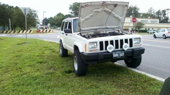 01 xj 2in bb 235/75/15's blown efan behind the magic kingdom
