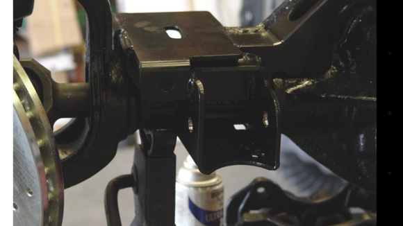 This is the exact setup I'm looking to run. TNT coil and lca bracket. Built in tract bar and shock mounts. Shock mounts use a bolt instead of bar pins.