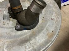 The OEM capped off thermostat housing 