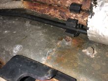 This is above the canister about the middle of the car. 