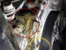 Isn’t that oil coming out under the harmonic balancer?