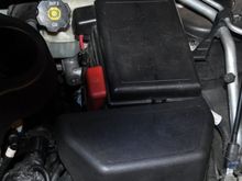 Under this cover, nothing below or underneath, just that Darth Vader helmet like plastic cover. 