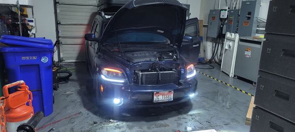 Emergencies on. Cant really notice but the fog lights are also turn signals  and the fog lights are led projectors with a halo light around them that halo is a running light and a orange turn signal