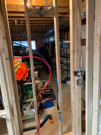 The drain is adjusted for height and the sink supply lines are ready for drywall, I still have to wire the lights and GFI receptacle 