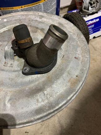 The OEM capped off thermostat housing 