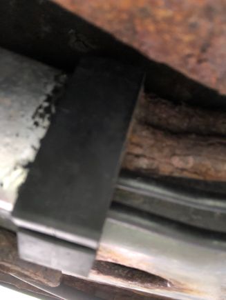 This is by the driver’s rear tire