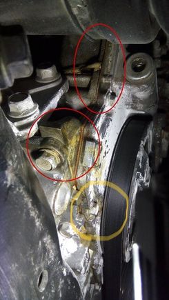 Isn’t that oil coming out under the harmonic balancer?