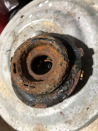 This is the crusty 9 year old piece , the rust scale caused rubbing and crunching while turning and binding the plastic bearing 