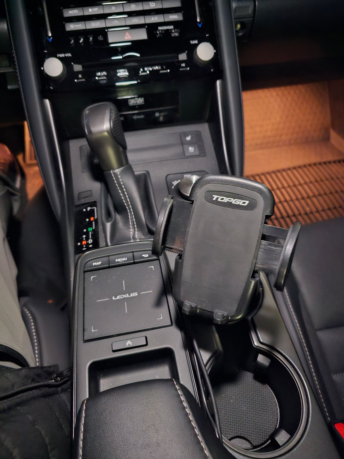 This is what i have. Works well. Has the charging cord but i hate giving up my cupholder. I like your set up too. Im trying to not cover up buttons/access as much as possible as well...