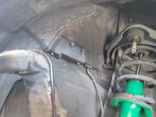 Make sure the brake hose is supported to prevent damage.