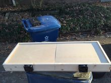 Started building amp box for trunk.  This is a back view the rear wall has holes cut in it and the box will slide up to it and the fans will stick thru the holes.